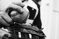 Black and white graphic for print or decor of baseball player holding ball in hand and mitt to pitch.  Good for man cave, game room or sports theme industry.