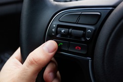 Buttons on the steering wheel to accept or reject calls from the phone.