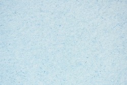 Highly Detailed Closeup Of Rough Pastel Paper Texture, Light Blue. Can be used as backdrop or overlay. Macro shot paper textured surface.