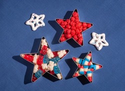 Patriotic red, white and blue, candy arranged in star shapes for Fourth of July