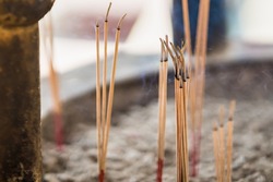 Burning incense sticks with white smoke on Incense burner,Incense smoke,Buddhism