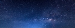 Panorama blue night sky milky way and star on dark background.with noise and  grain.Photo by long exposure and select white balance.