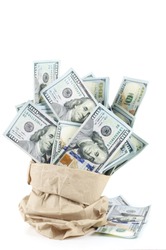 Heap of one hundred dollars in paper bag isolated on white background.