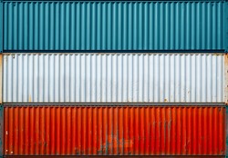 The surface texture of the sea container.Three containers without labels.