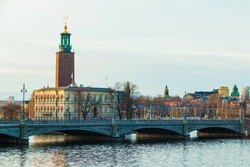 Panoramic view of Stockholm with the Vasabron Bridge, the Stromsborg Islet and the tower of the Stockholm City Hall in winter day, Sweden