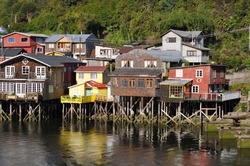 Palafitos on Chiloe Island, Chile. Chiloe Island is the largest island of the Chiloe Archipelago off the west coast of Chile, in the Pacific Ocean.