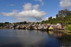 Palafitos on Chiloe Island, Chile. Chiloe Island is the largest island of the Chiloe Archipelago off the west coast of Chile, in the Pacific Ocean.