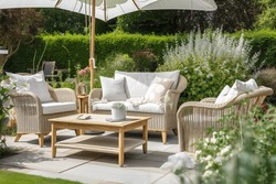 Charming Serene Garden Patio With Cozy Outdoor Furniture, Accent Pillows and Relaxing Setting