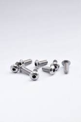 Group of button hex head screw stainless steel against white background