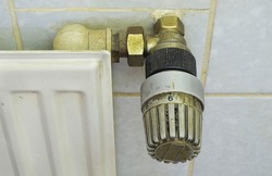 outdated  old and dirty radiator valve, renewal of the heating  and co2 savings concept,free copy space