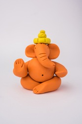 Homemade Lord Ganesha idol for Ganesh Chaturthi Festival using colourful clay or play dough