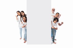 Multigenerational Indian asian family with white board, pointing or presenting empty white placard