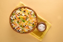 Indian Veg Pulav - Basmati rice  is browned in oil and then mixed with vegetables nuts, fruits etc. selective focus