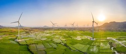 PANORAMIC VIEW OF WIND FARM OR WIND PARK, WITH HIGH WIND TURBINES FOR GENERATION ELECTRICITY WITH COPY SPACE. GREEN ENERGY CONCEPT. NINH THUAN, VIETNAM