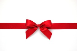 Red gift bow on white background