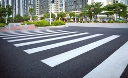 pedestrian crossing, white stripes on black asphalt, road markings zebra crossing, place to cross the road, traffic rules