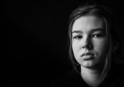 Pensive teenage girl black and white portrait