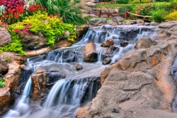 A small waterfall at a miniature gold course in High Dynamic Range