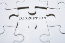 The word disruption written with a typewriter.