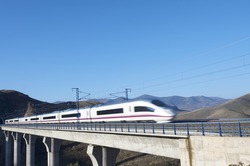 view of a high-speed train crossing a viaduct in Purroy, Saragossa, Aragon, Spain; AVE Madrid Barcelona