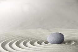 spa and zen background relaxation and meditation concept for purity spirituality serenity calmness peaceful harmony simplicity relax sand and stone with lines and copyspace
