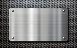 stainless steel metal plate over perforated background
