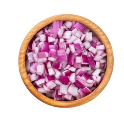 chopped red onions in a wooden bowl isolated , top view