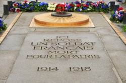 the Tomb of the Unknown Soldier from World War I beneath the Arc de Triomphe, in Paris, France