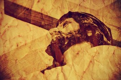 a figure of Jesus Christ carrying the Holy Cross, with a retro effect