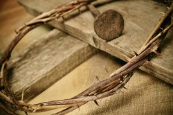 a representation of the crown of thorns and the cross of Jesus Christ