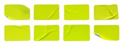 A set of fluorescent neon yellow rectangular paper sticker label isolated on white background.