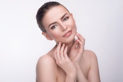 Natural beauty portrait of beautiful young woman model face with clean skin. Wellness, skincare and naturally make-up