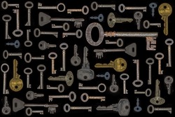 collection of old keys on black