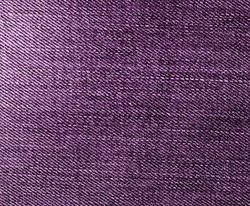 Jeans texture in purple color. Abstract background and texture for design.