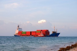 Cargo ship crossing the coast in Makassar, Indonesia