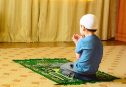 Little Muslim worshiper.