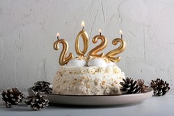 New Year's cake with candles 2022