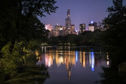 Night cityscape of Manhattan from Oak Bridge in Central Park