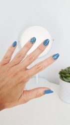 Nail decoration in blue and green tone