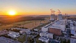 Sunrise over the Dukovany nuclear power plant with cooling towers in the Czech Republic
