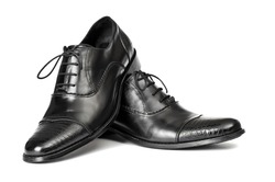 Close-up of elegant men shoes on white background