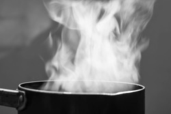 Selective focus steam over cooking pot
