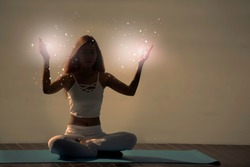 Yoga meditation woman pose with seven chakras, aura, spiritual.