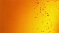 Macro photo of bubbling beer, closeup. Abstract beverages background, fresh look.