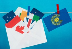 Flag of the Commonwealth of Nations (CIS), envelope with countries flags. Commonwealth Day card 