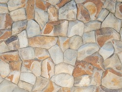 Masonry sandstone texture wall. Textured sandstone wall masonry cladding. Not a seamless texture.