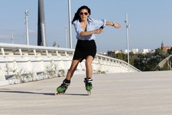 woman skater speeding with a skirt in Zaragoza, Spain