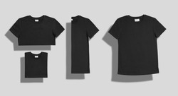 Black plain cotton shortsleeve crewneck t-shirt shot unfolded and folded in three different ways as a set isolated on white