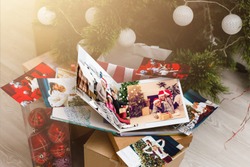 view open book with album christmas at home