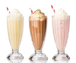 Three glasses of various milkshakes (chocolate, strawberry and vanilla) isolated on white background